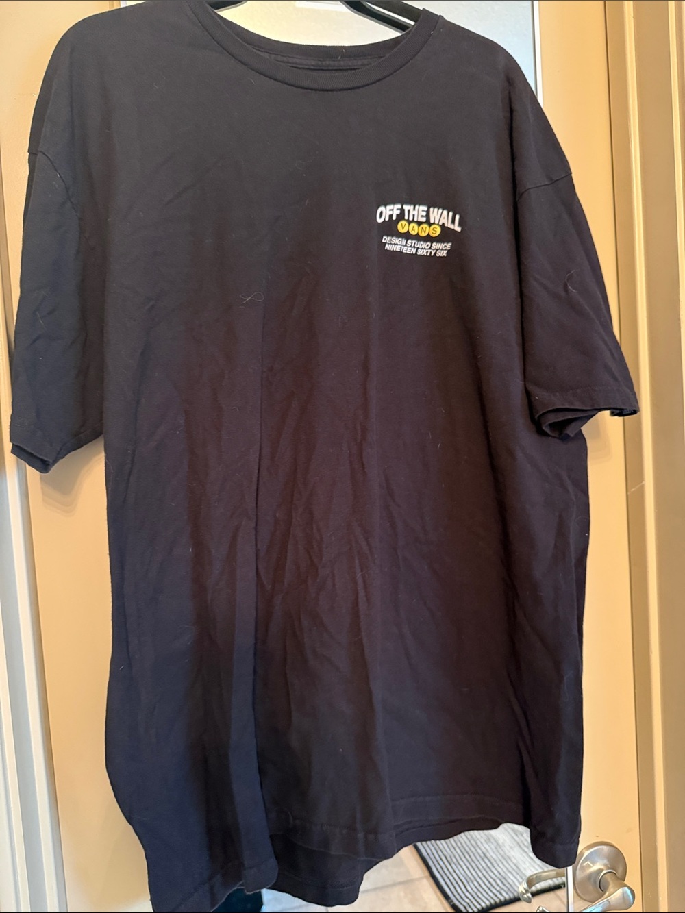 Vans Black Short Sleeve Tee with Small Off The Wall Chest Graphic
